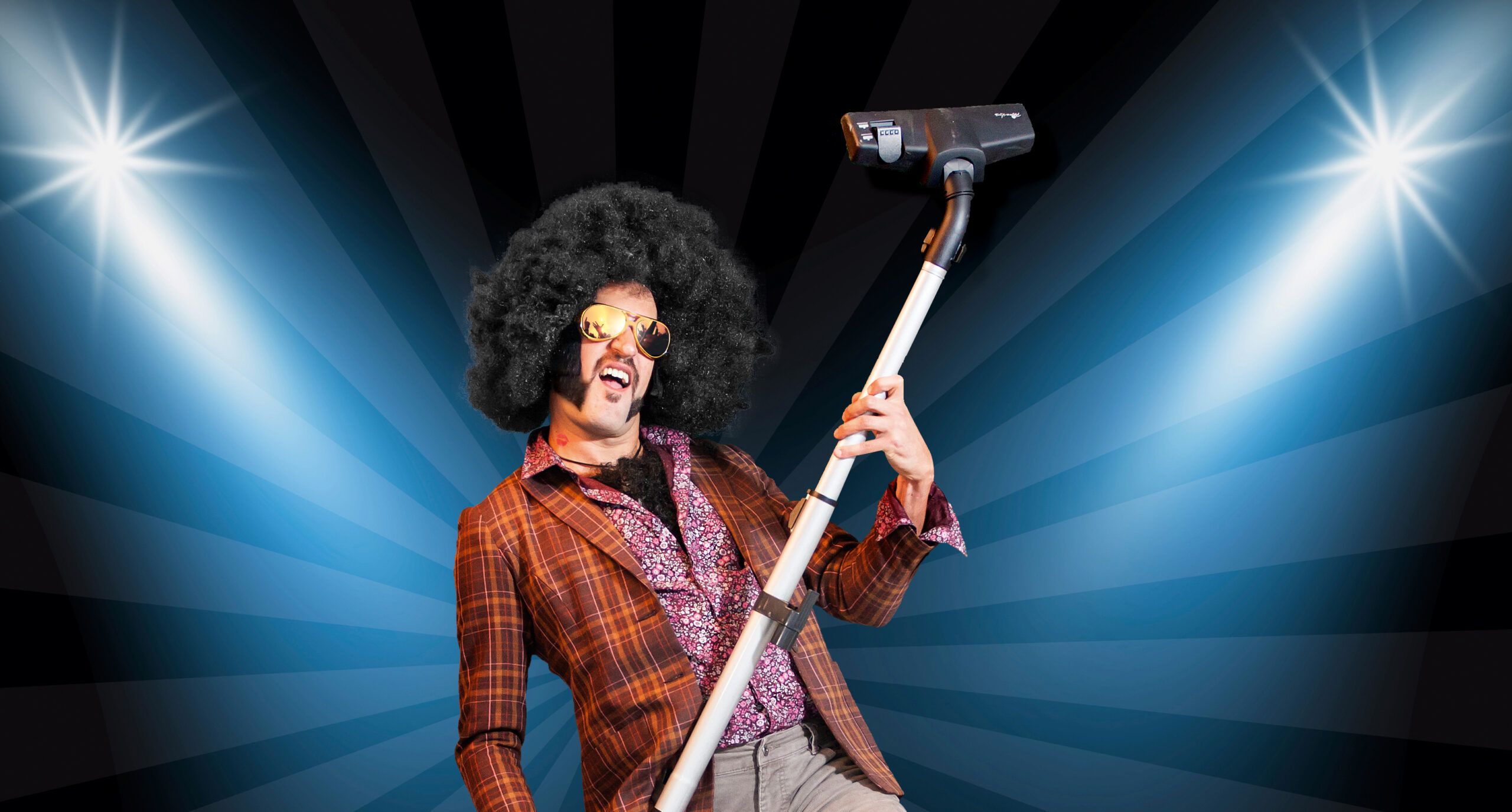 Photo d'un homme avec une coupe de cheveux afro pour l'affiche de Moutier Expo 2015.