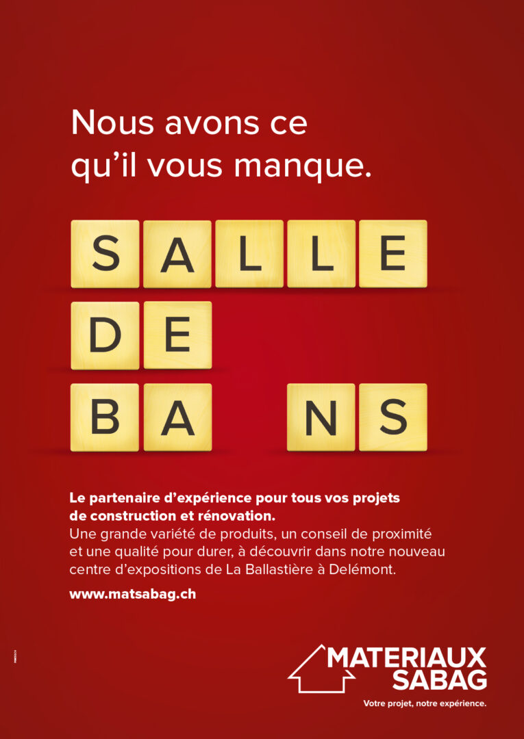 Affiche publicitaire avec écrit "Nous avons ce qu'il vous manque", ainsi que "salle de bains" sans le "i" de "bains".